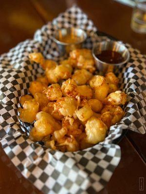 Cheese curds battered with summit beer, served with balsamic aioli and sambal honey dipping sauces