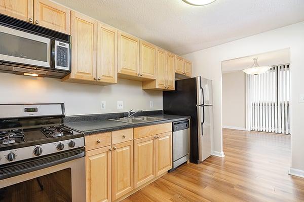 Kitchen features upgraded appliances in select apartments