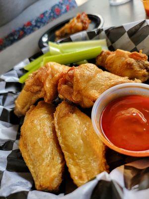 8 jumbo sized wings with hot datil pepper sauce.