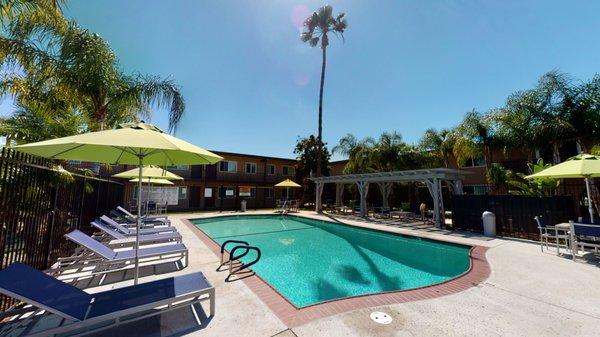 Swimming Pool at Huntington Cove Apartment Homes in Huntington Beach, California. Pet Friendly Studio, One, Two and Three Bedrooms.