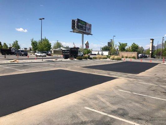 Finishing some patching in a parking lot in South Ogden, Utah.