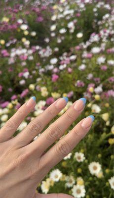 Acrylic nails with blue tips for spring