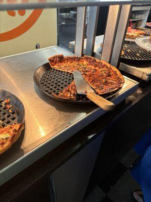 The buffet was almost empty except for the 2 burnt pizza.