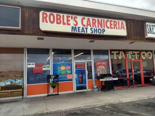 Family run meat market.  Veggies,  canned goods, detergent, TP, spices, soft drinks. Carnitas, menudo on weekends.