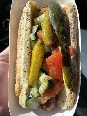 Gently loaded, regular size Chicago Dog. It was delicious!  My 1st trip back after 30+ years. Everyone was eating in their cars.