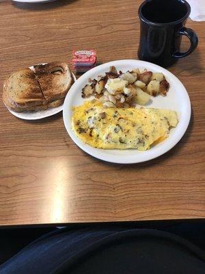 The Norman omelette, Two egg omelette with sausage and bacon.  Potatoes , Rye toast and coffee.  $6.75