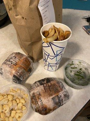 Pulled pork sandwich, 3 little pigs sandwich, small green beans, small Mac n' cheese, large fry.