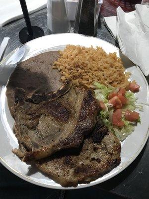 Pork chops, rice and beans with 5 tortillas. A lunch special, pretty good and good amount of food. I'd order again.