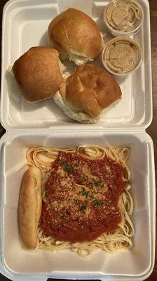 Spaghetti marinara, bread stick, rolls, honey butter.