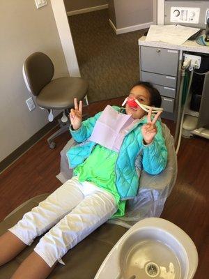 Getting ready to "wiggle" her teeth out