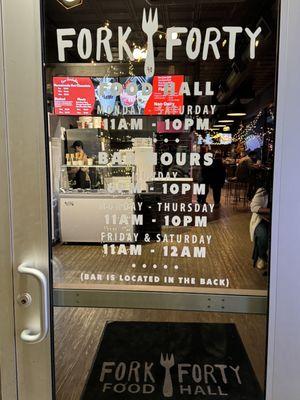 No signage outside, one of many small restaurants in this "food hall"