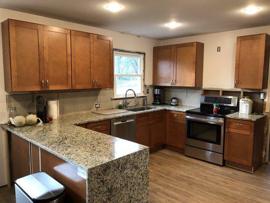 Remodel was still a WIP - though check out the beautiful granite countertops and waterfall!