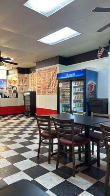 Inside of restaurant with tables and menu