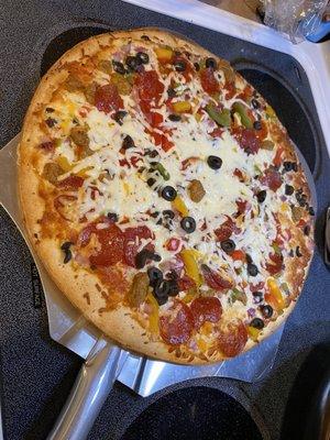 Take and Bake Supreme pizza - $5.99