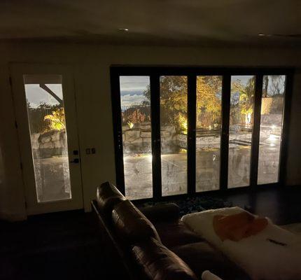 Bi folding doors at night.  This was taken without the casing.