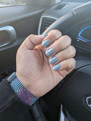 Gel Manicure with chrome in natural lighting