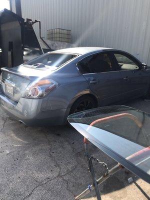 2009 Nissan Altima back glass replacement.