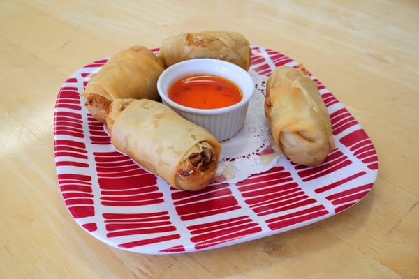 Egg Rolls. Deep Fried Egg Roll Skin Stuffed with Chicken, Carrot, Clear Noodle, Vegetables, Served with Sweet and Sour Sauce.