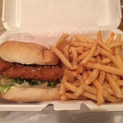 Spicy chicken sandwich with fries.