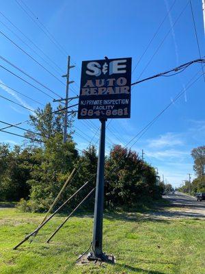 Auto shop street sign