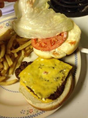 White lettuce, loaded with mayonnaise, and a pitiful patty.  Not what I ordered.