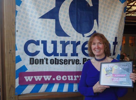 Owner Linda Griebe, DVM, accepts the award for Ann Arbor's "Best of" for Veterinary clinic in Current Magazine for 2014.