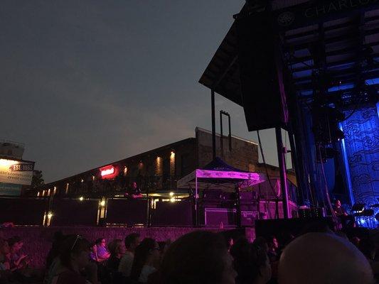 Vendors adjacent to the stage area. Industrial hip.