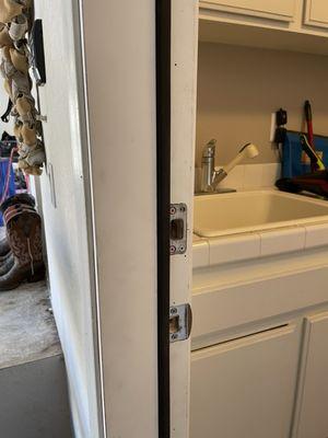 Garage door into laundry room forced open..... replaced the door frame, no need for a new door.