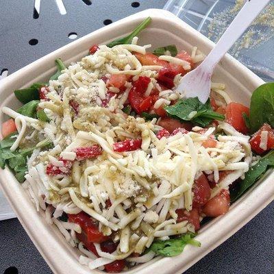 The Florence Rice Bowl: chicken, spinach, parmesan, red peppers, tomatoes, provolone, and basil pesto dressing. My favorite!