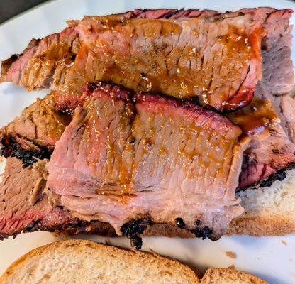 Brisket on bread with BBQ sauce