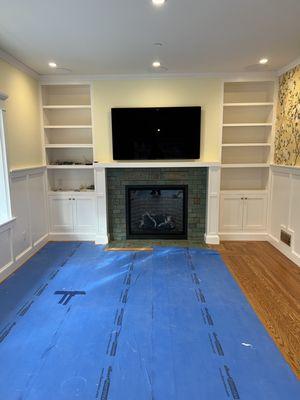 Living room built in cabinetry and tile work.