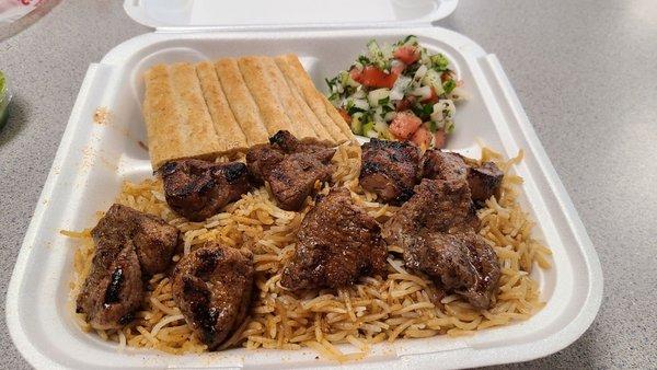 To-go style. Lamb kabob with brown rice. All delicious!