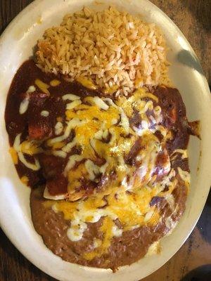 Mexican rice, cheese enchilada, pork tamale &refried beans