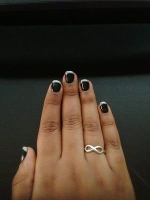 Tiffany is an artist. Loving my black shellac with glitter tips!