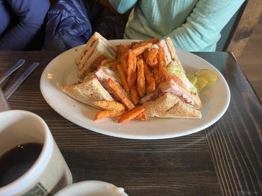 Club sandwich with sweet potato fries