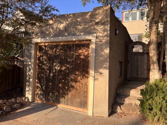 Custom wooden tilt-up door installed. Next step is sanding and staining, but it looks great the way it is.