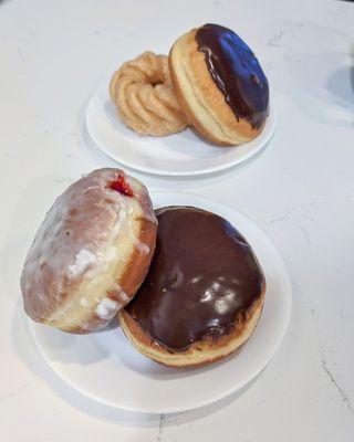 Strawberry and chocolate glaze custard paczki