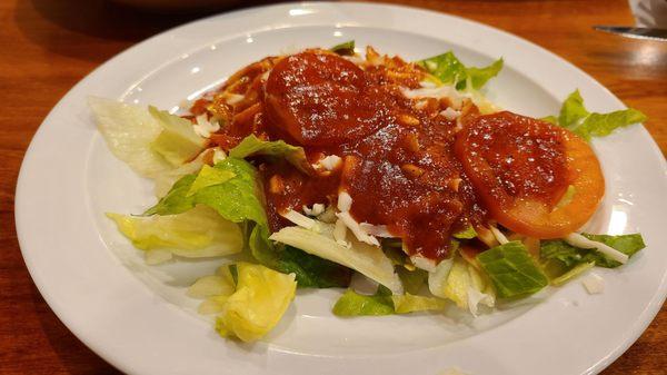 Side salad with what is supposed to be Italian dressing