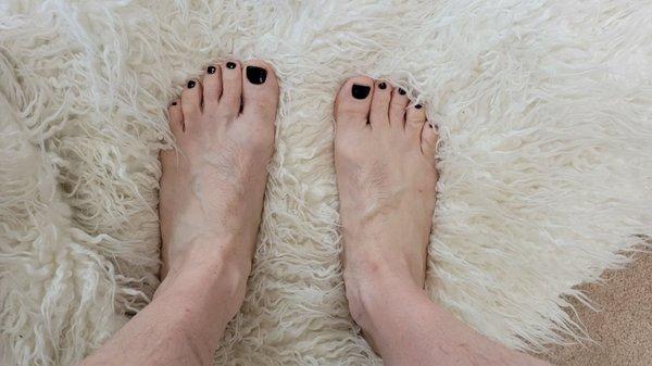 Black nail polish isn't too weird is it?  Probably the oldest and ugliest feet in any review.