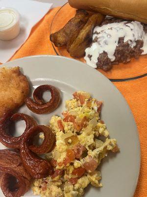 Breakfast: nuegados, huevos con verduras y salchicha, casamiento con crema, plátano y pan (we ordered this to go & split it = small portion)