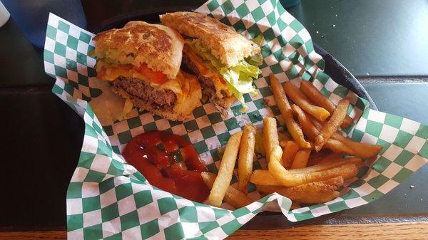 Bandera Cheeseburger with jalepeño cheese bun, it's pretty big so I cut it in half!