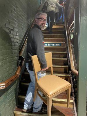 The Depot: cool dining car train.  Our scout carrying our chair upstairs to seat our 5th guest.