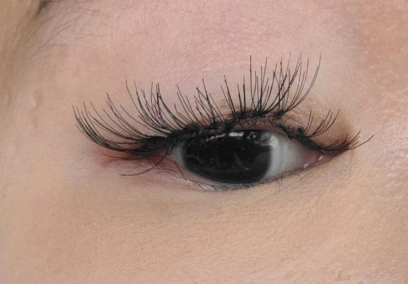 Eyelash extension. She glued the corner of my bottom lashes to the top too...