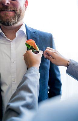 He made the wedding party matching boutonnières and corsages.