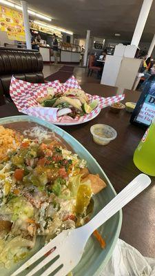 Carne asada Tacos, chicken floutas with rice and beans. They have beer too!