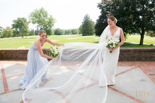 Happy Bride with her stunnign veil on her wedding day!