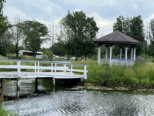 Bridge decaying into pond.