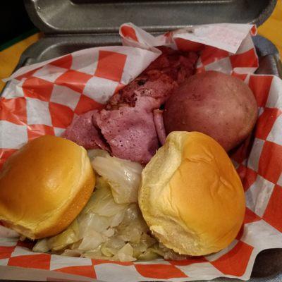 Corned beef with cabbage and a boiled potato along with two rolls. It was delicious as always. Only available Saint Patrick's Day. 3/17/22