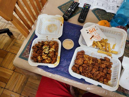 Buffalo Honey chick n pop on the left & PB&J chick n waffle on the right with some peanut sauce & fries.