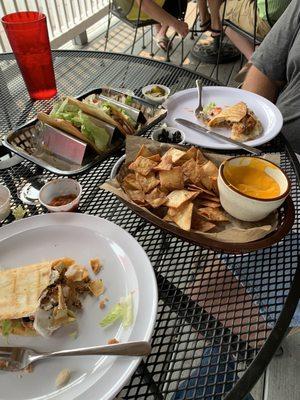 4 tacos for 6.00, homemade nachos and cheese